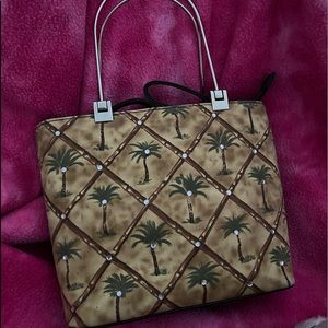 Palm tree with crystals and chrome color handles, also has crossbody strap